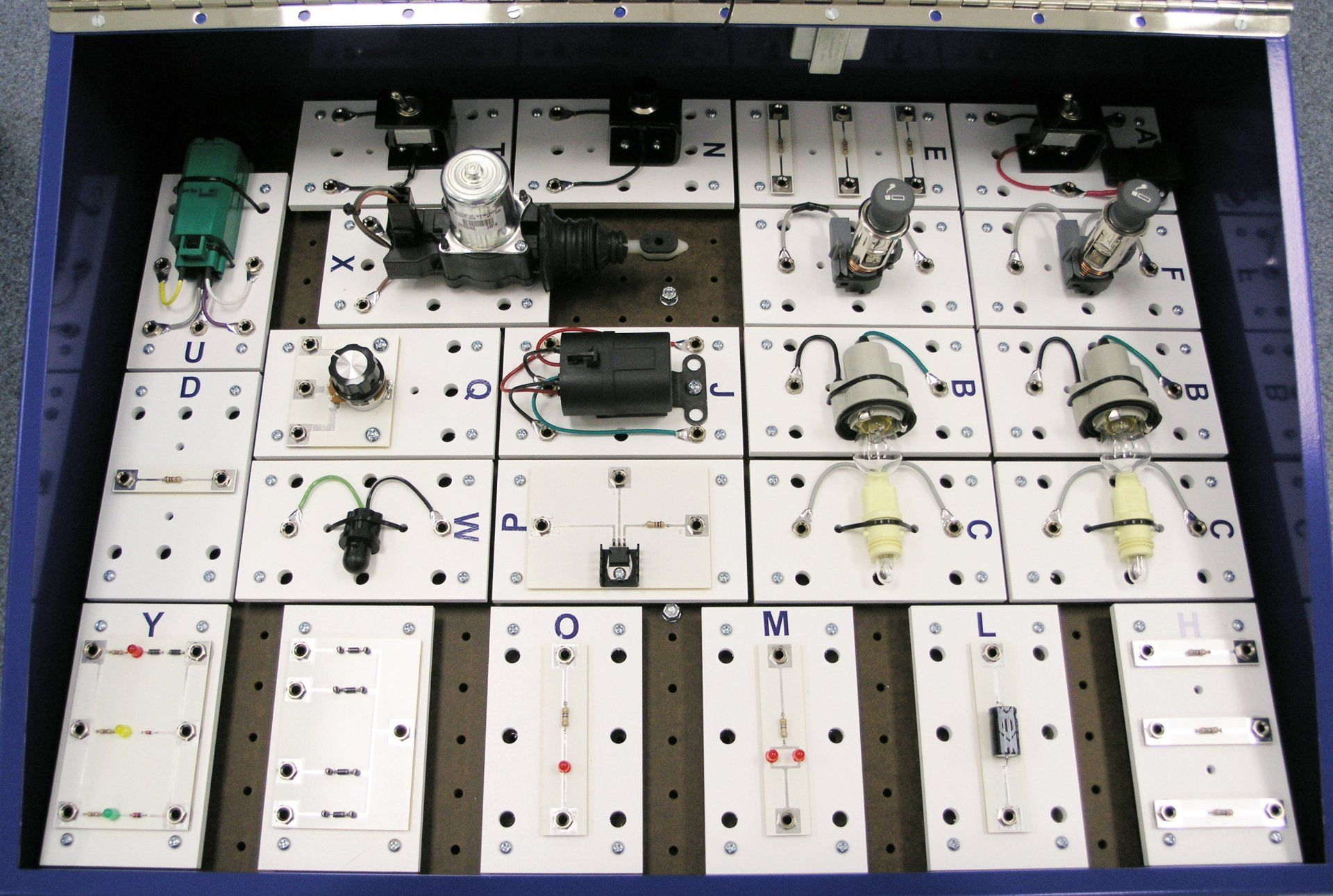 A bunch of circuit boards with the letter l on them