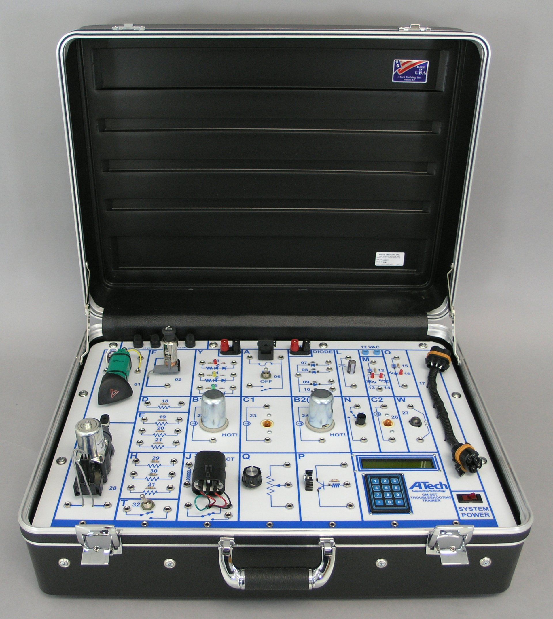A briefcase with a bunch of electronic components in it