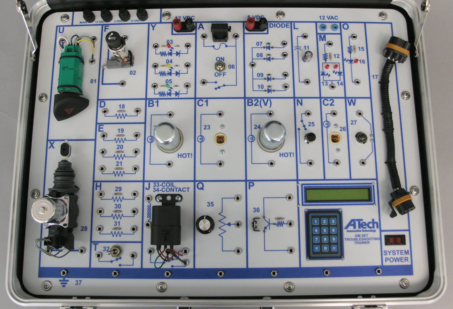 A briefcase filled with electronic components and a display that says atech