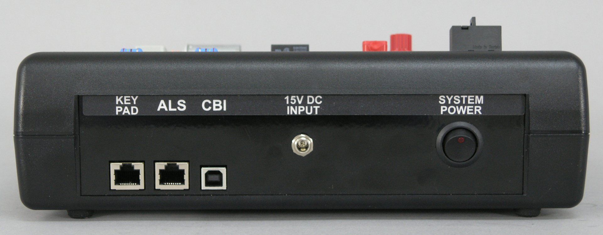 A close up of the back of a device that says als cbi