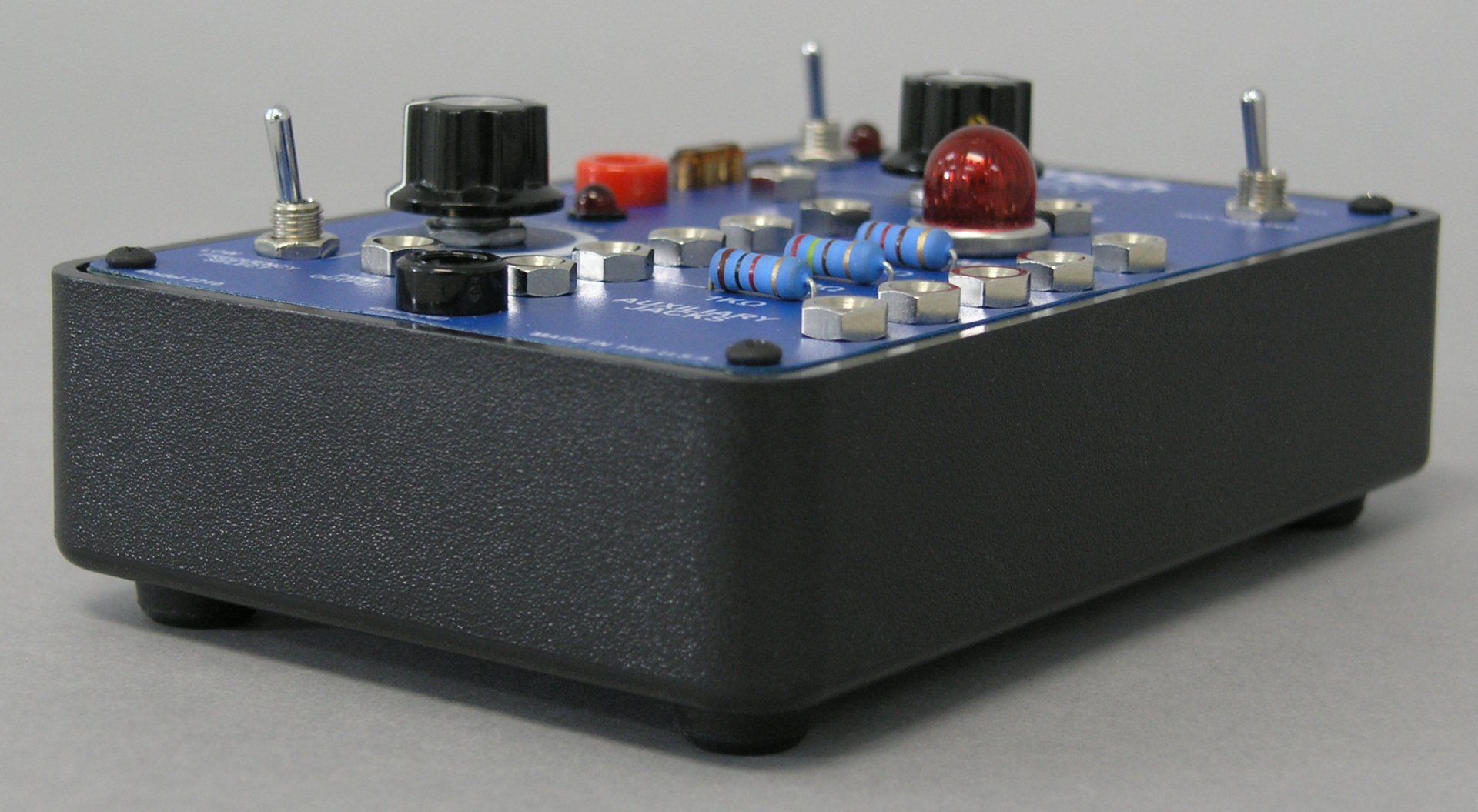 A blue box with a red light on top of it