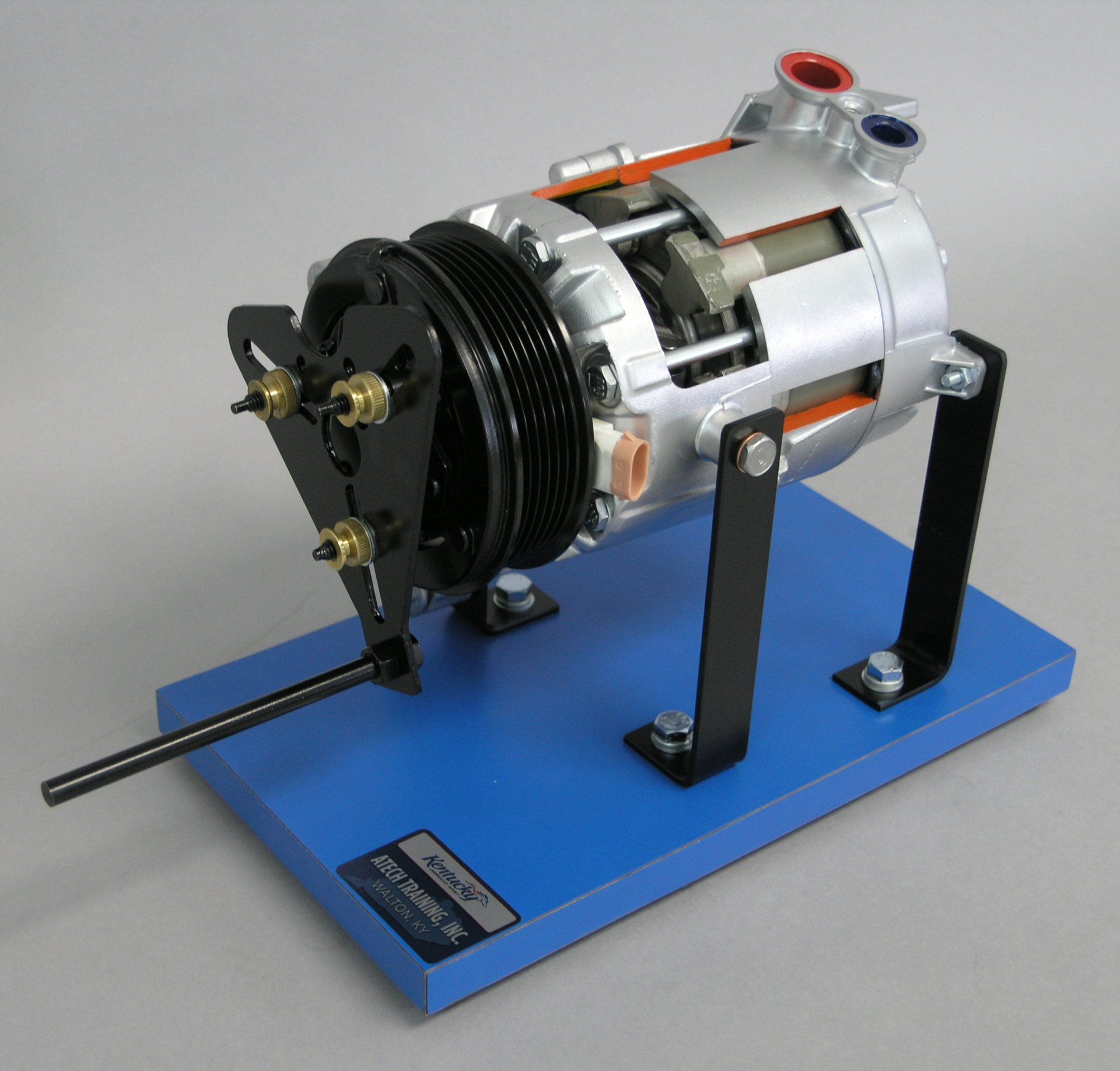A model of a car air conditioner on a blue base