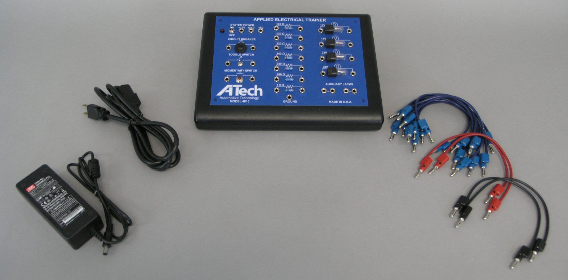 A blue and black device with attach written on it