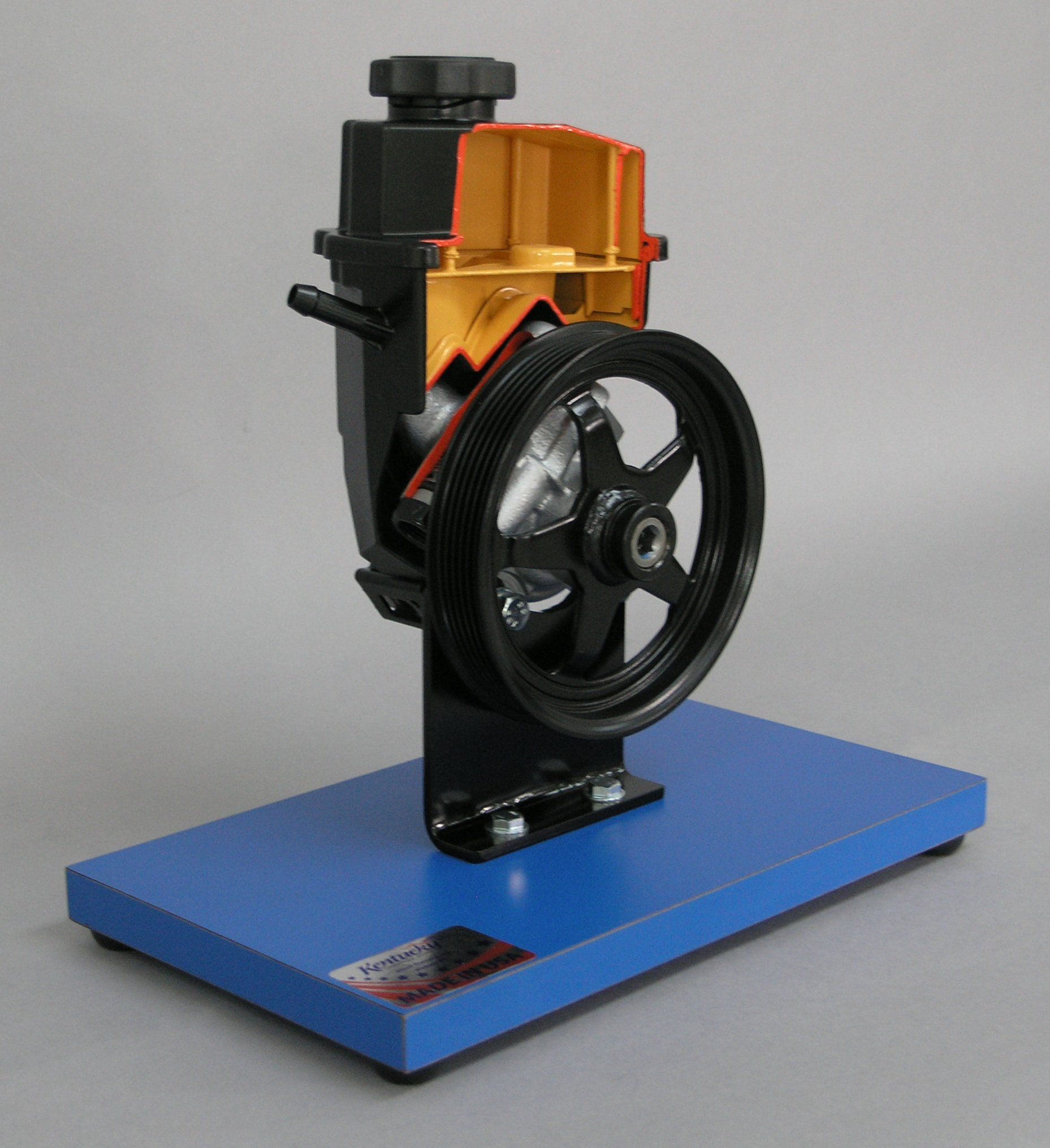 A model of a power steering pump on a blue base