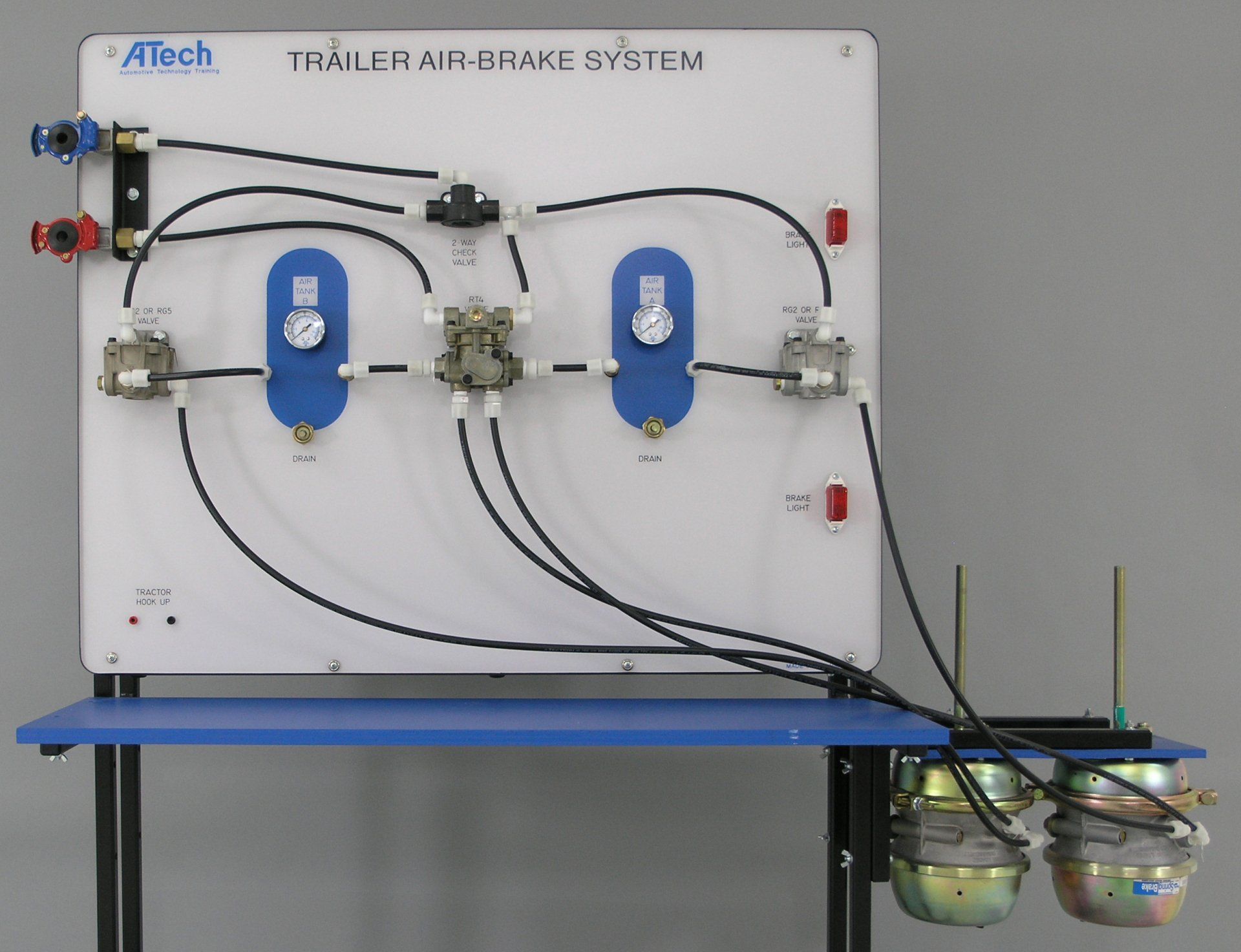 A trolley air brake system is displayed on a table