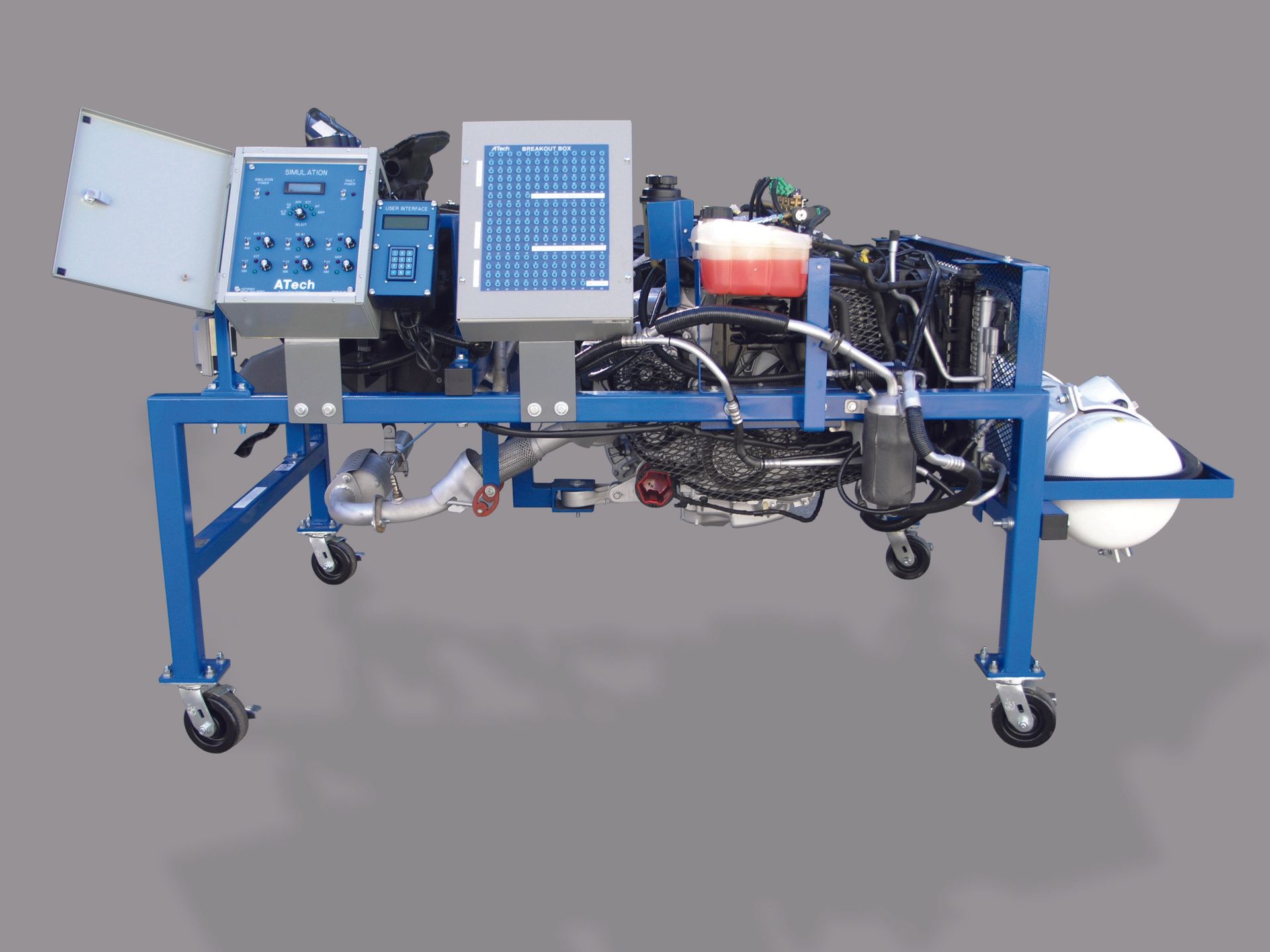 A blue machine with a computer on top of it
