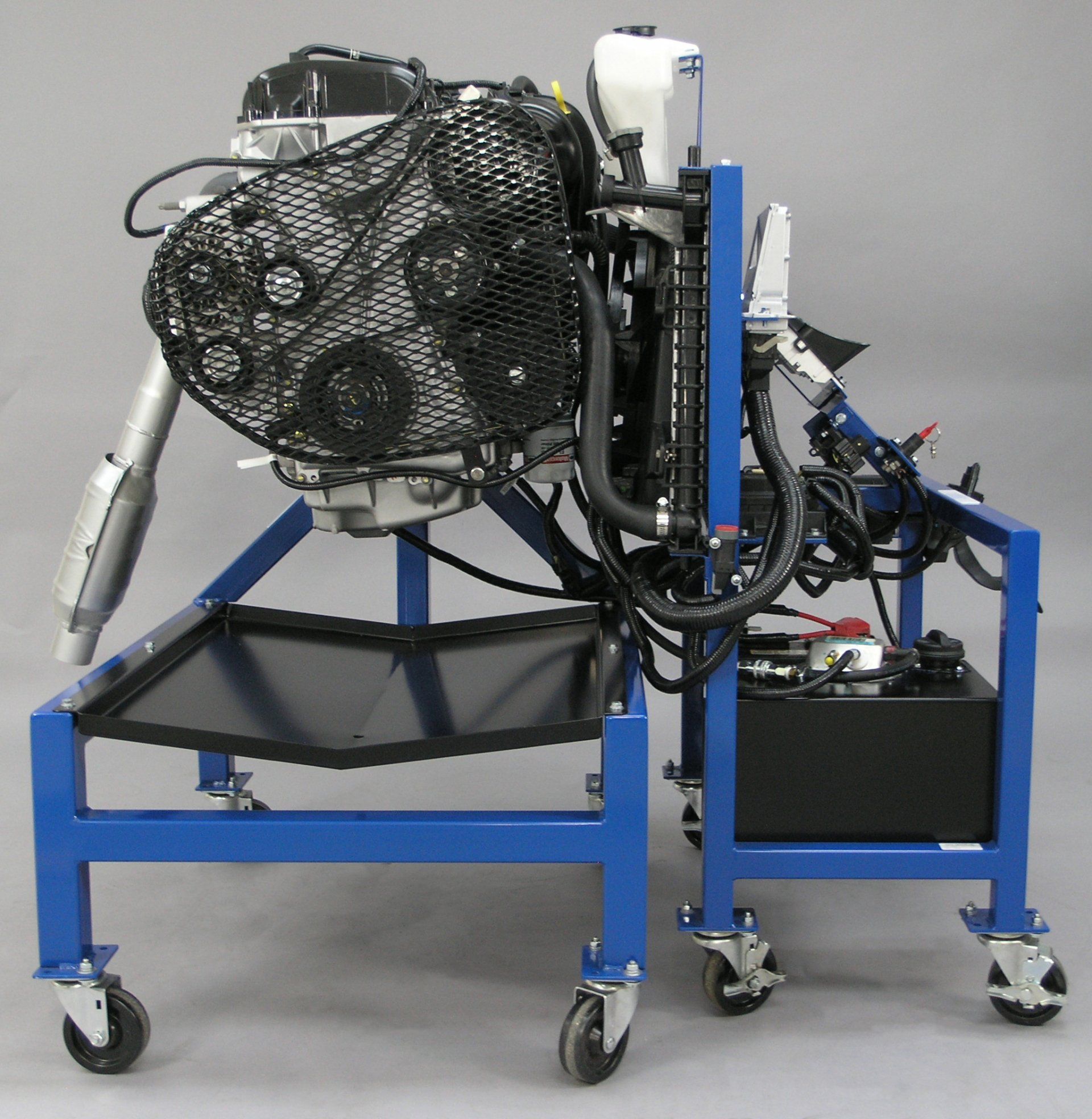 A blue cart with a fan attached to it
