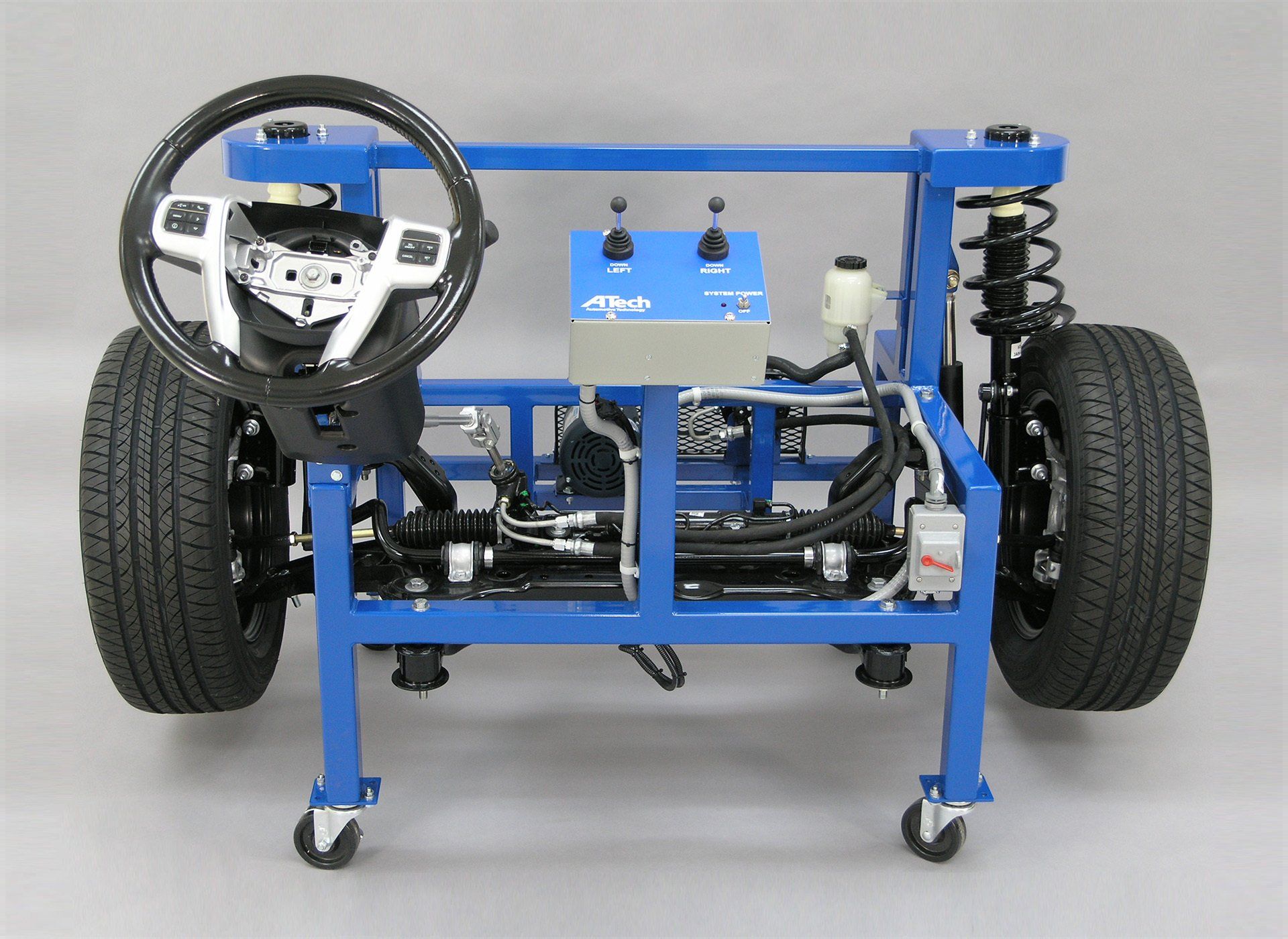 A model of a car with a steering wheel and suspension