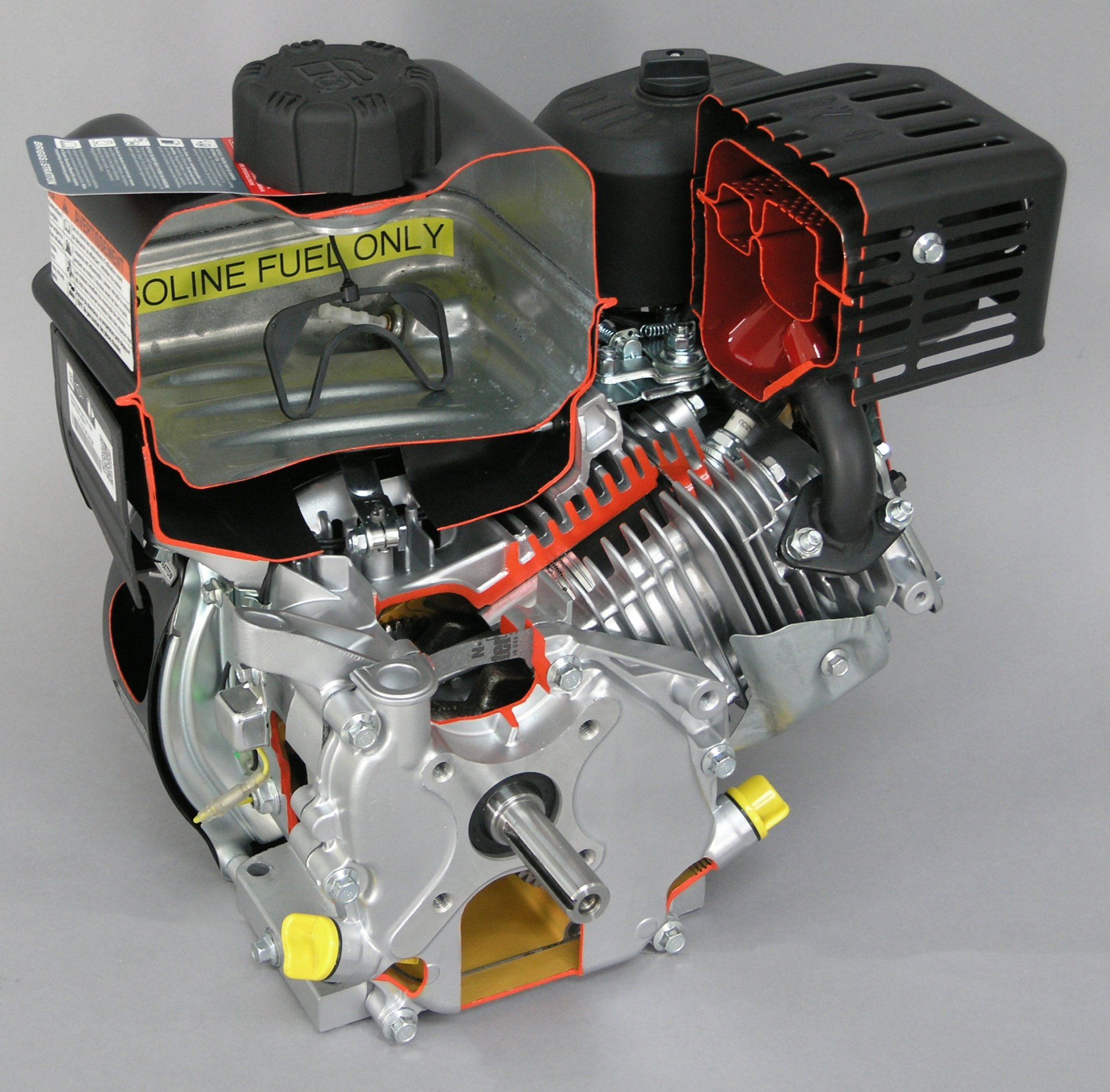 A lawn mower engine is cut in half and says cline fuel only