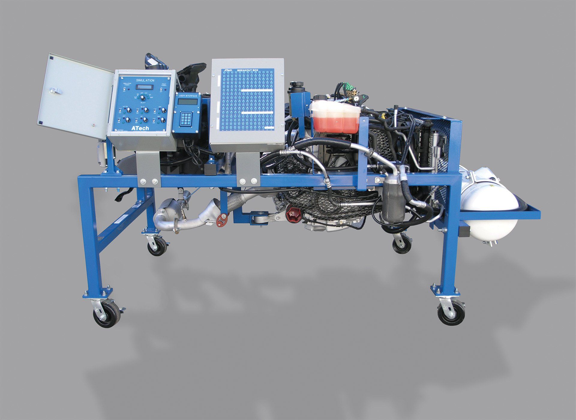A blue and white machine with a computer on top of it