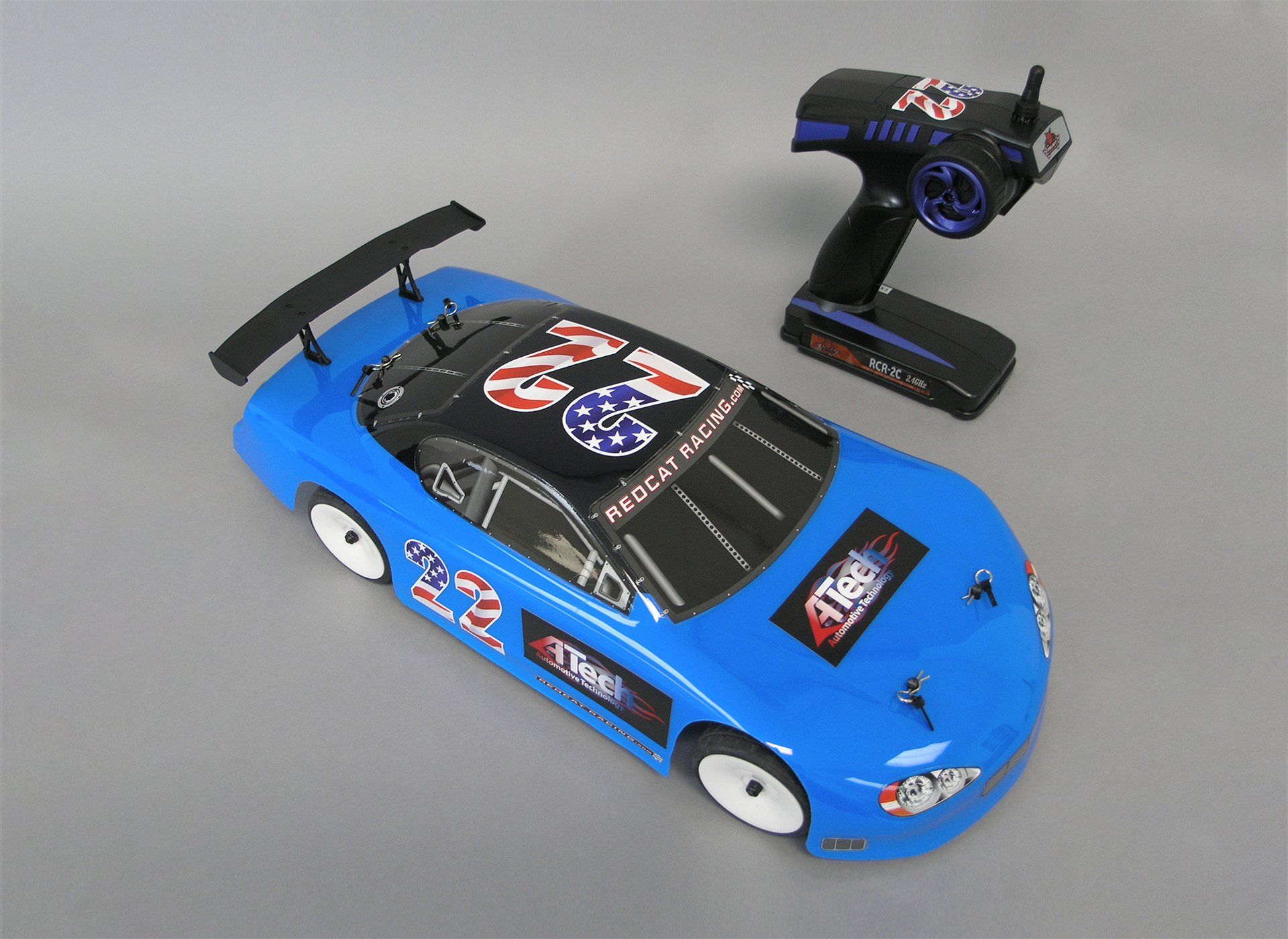 A blue rc car with the number 12 on it