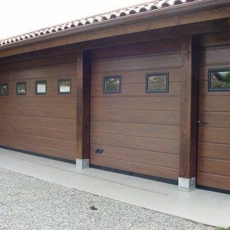 PORTONI SEZIONALI CON OBLO' E PORTICINA