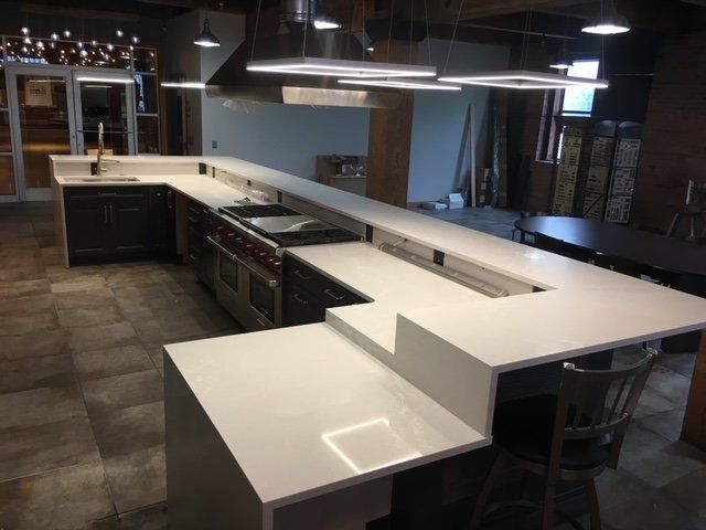 Artisan Culinary Loft - Buffalo, NY - 2017 - double waterfall Caesarstone Quartz