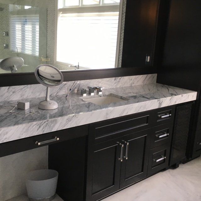 Mitered Calcutta Marble Countertops in Buffalo, NY Bathroom
