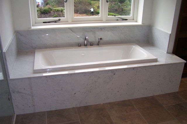 Donna Sandra Tub in Granite Bathroom