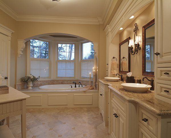 Vyara Junparana Granite Countertops featuring Ogee edge with vessel sinks