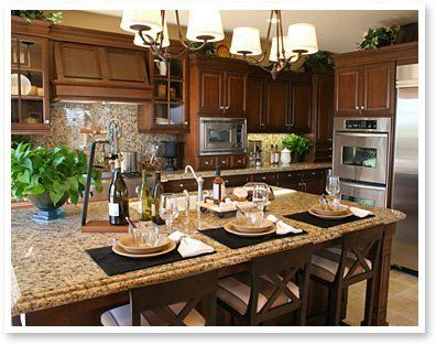 Santa Cecelia Granite Countertops featuring full height backsplash