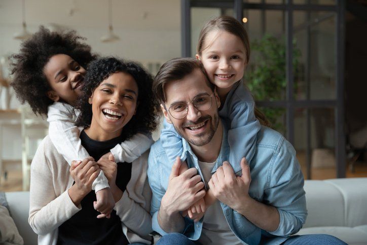 Family In Living Room — Fresno, CA — Lucky Bail Bonds