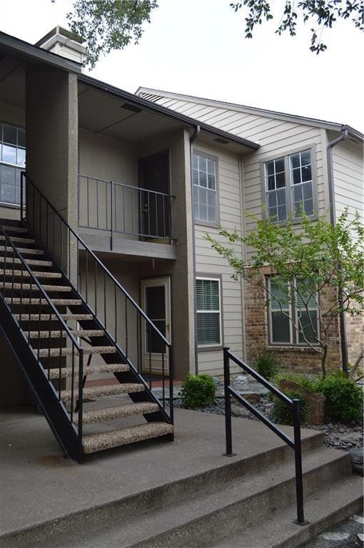 A house with stairs leading up to the second floor