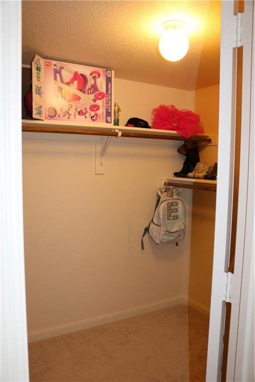 A closet with a bag that says k23 on it