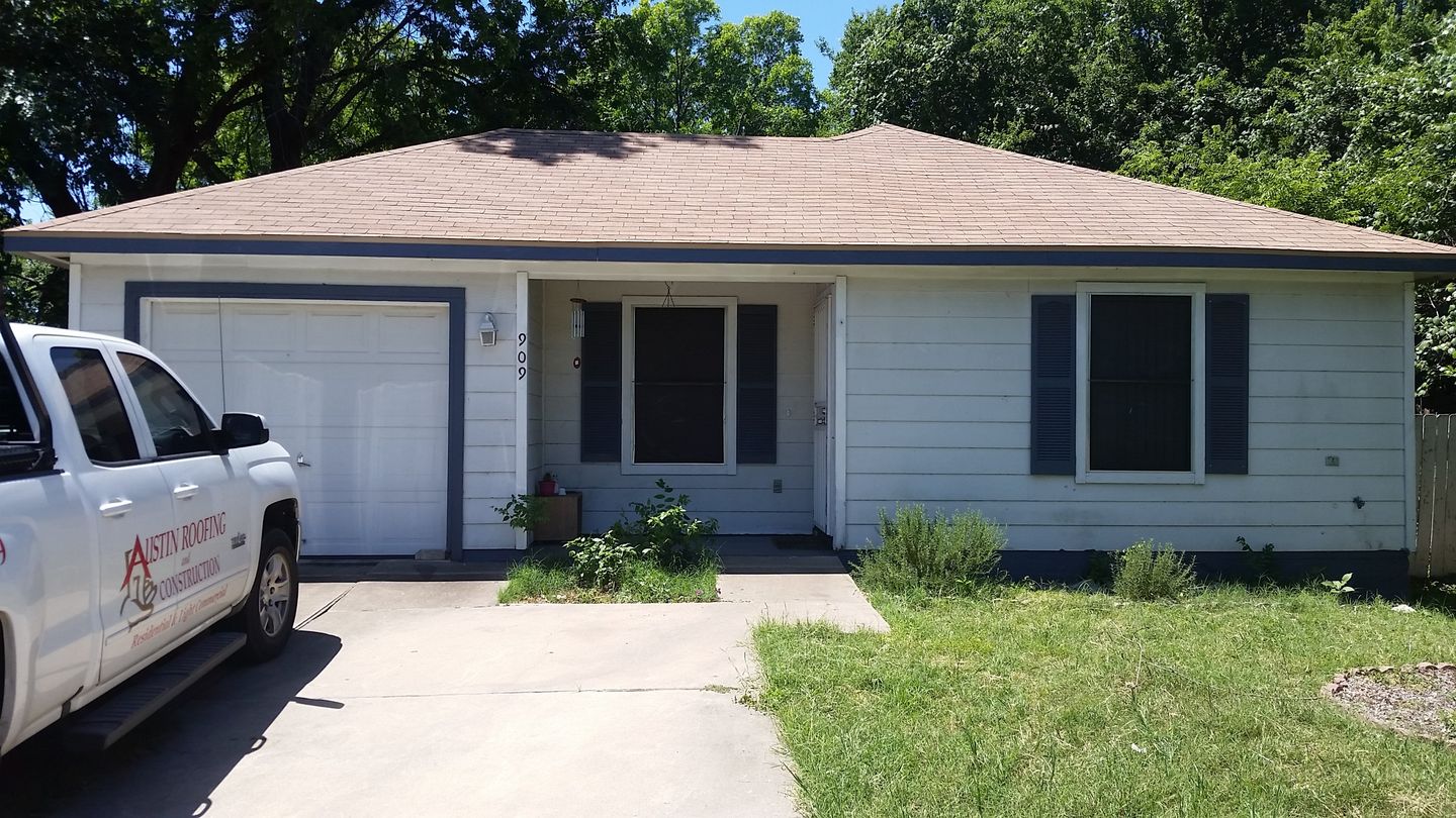 25 year 3-tab Royal Sovereign Golden Cedar Color - Austin Roofing and Construction - North Austin Home