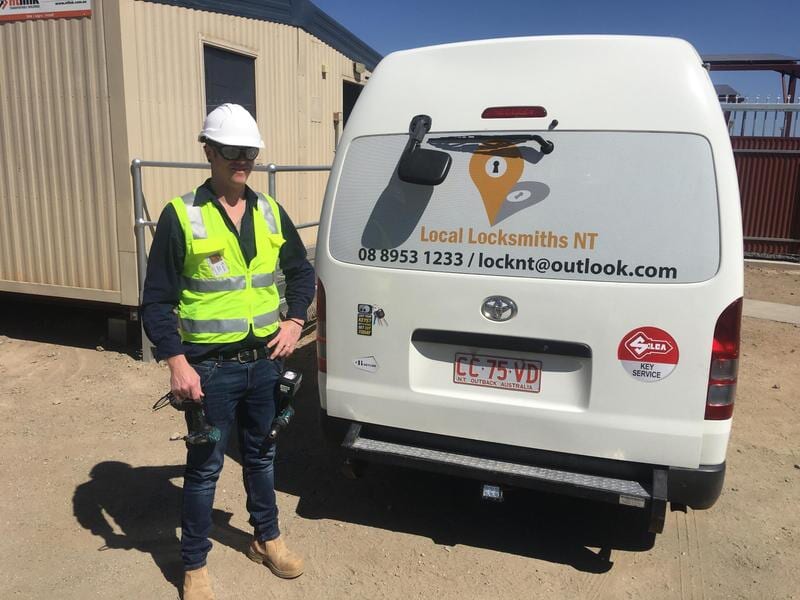 Locksmith Worker In Front of Work Van — Lock Locksmiths NT in Alice Springs, NT