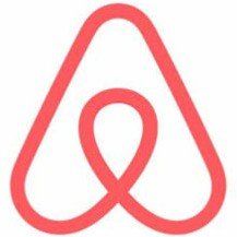 The airbnb logo is a red triangle with a heart in the middle.