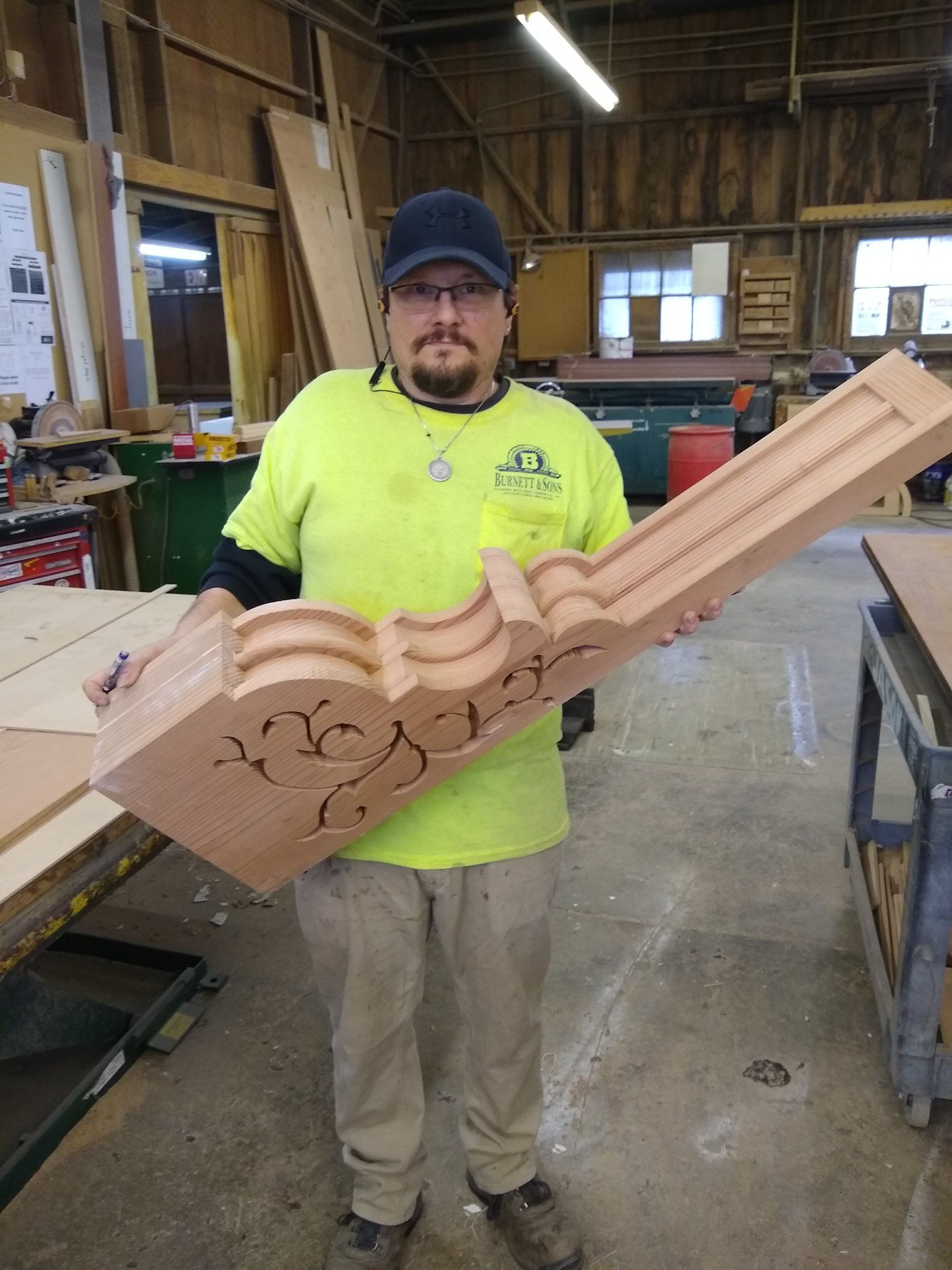 Man Holding a Custom Lumber — Sacramento, CA — Burnett & Sons