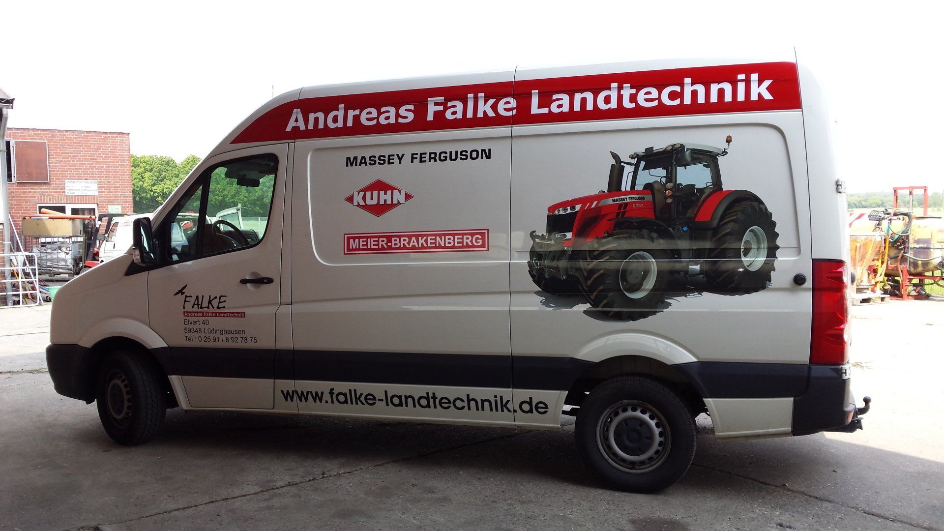 A white van with andreas falke landtechnik written on the side
