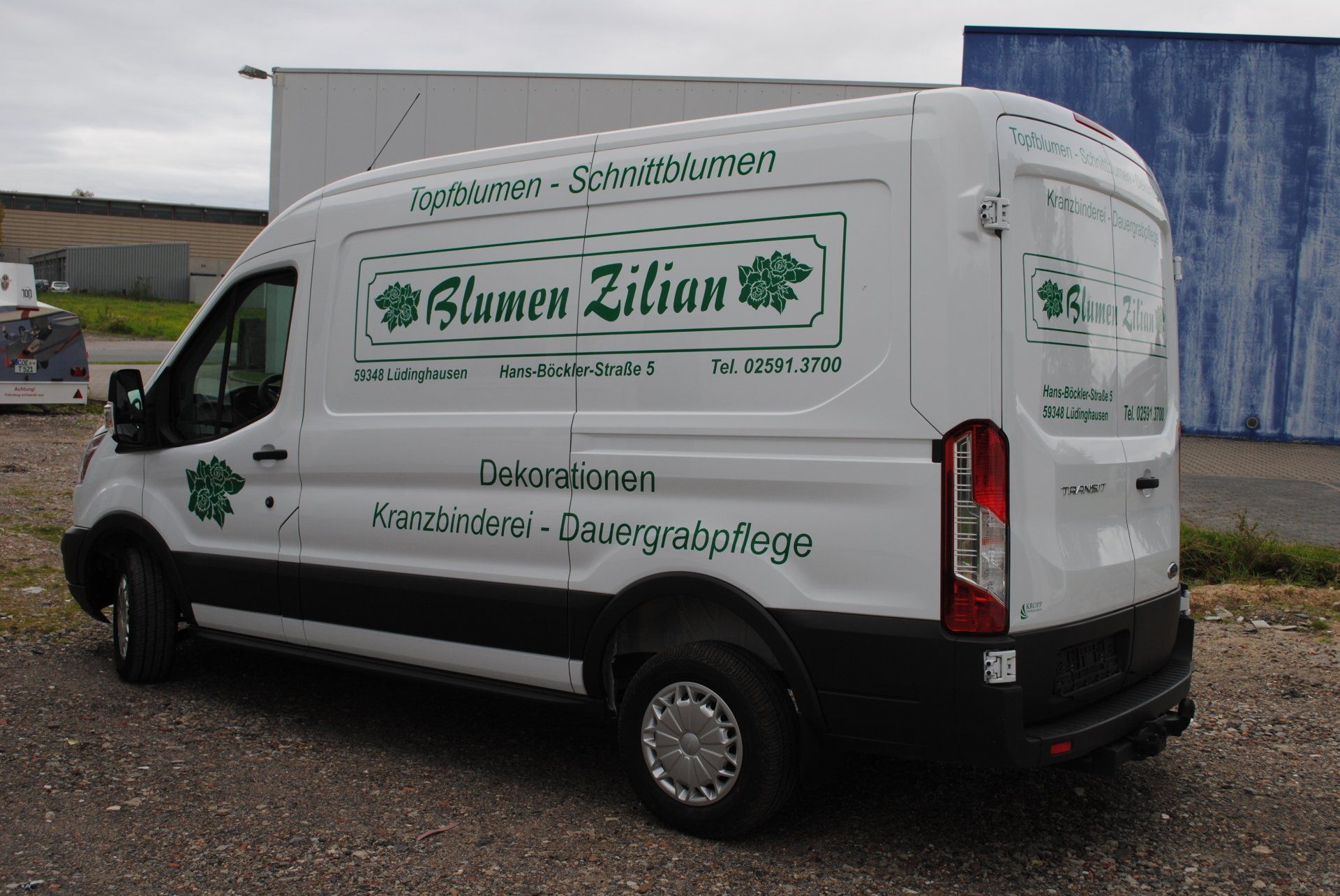 A white van with blumen zilian written on the side
