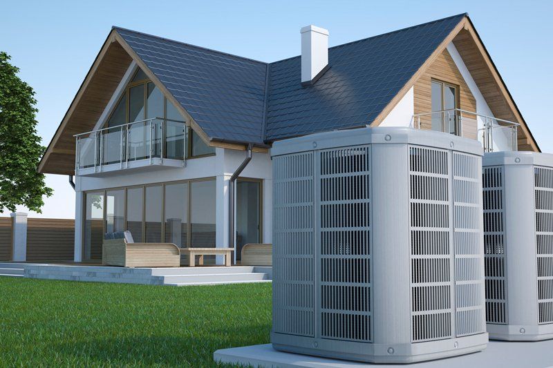 HVAC In Front Of House — Cairo, GA — Parker’s Heating & Cooling, Inc. HVAC In Front Of House — Cairo, GA — Parker’s Heating & Cooling, Inc.