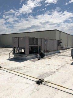 Repairing Commercial Air Conditioner — Cairo, GA — Parker’s Heating & Cooling, Inc. Repairing Commercial Air Conditioner — Cairo, GA — Parker’s Heating & Cooling, Inc.