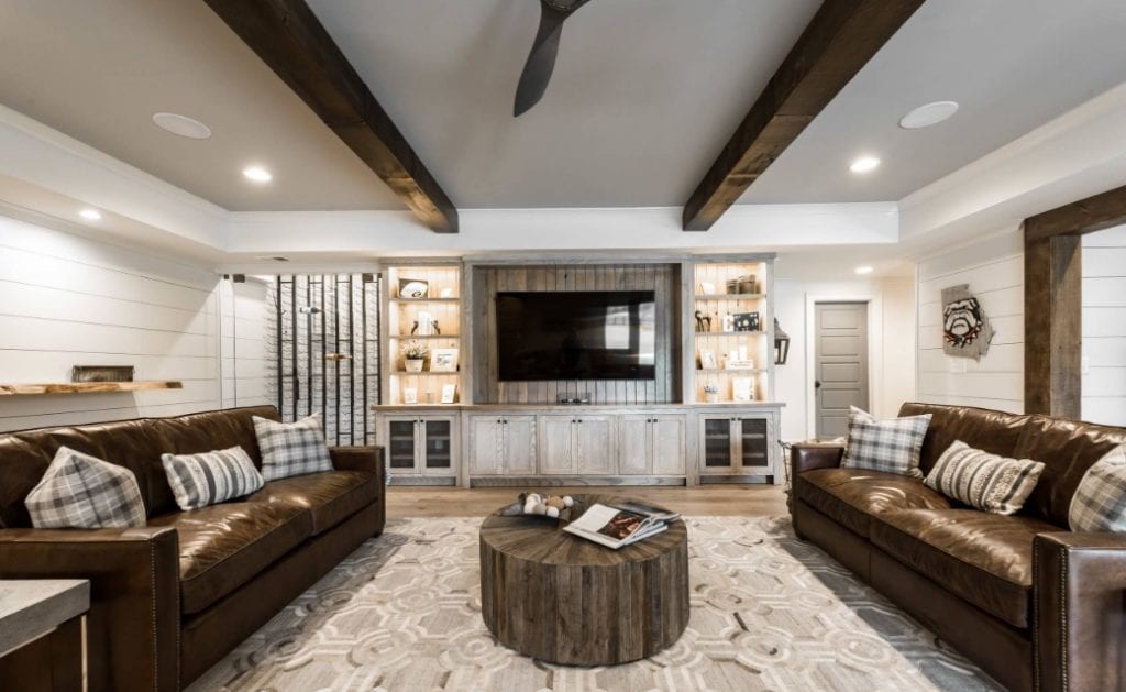 A living room filled with furniture and a flat screen tv.