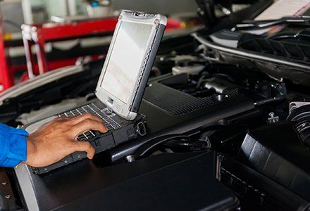 Transmissions — Mechanic with Laptop in Belleville, N Transmissions — Mechanic with Laptop in Belleville, N