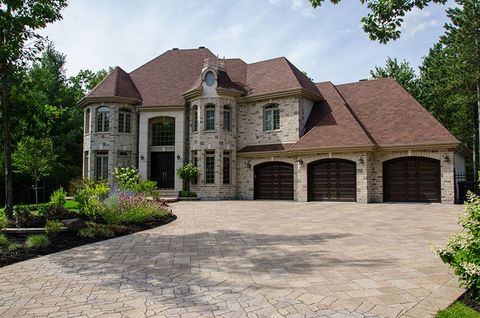 Garage Door Service — Mansion with Three Garage Door in Bartonville, IL