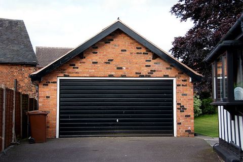 Garage Door Repair — House with Siding and Garage Door in Bartonville, IL Garage Door Repair — House with Siding and Garage Door in Bartonville, IL