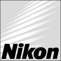 A black and white nikon logo on a gray background