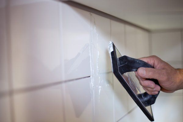 working on tile