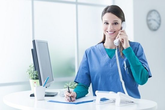 Female Doctor At The Reception Desk — Norfolk, VA — Secretariats Inc. Female Doctor At The Reception Desk — Norfolk, VA — Secretariats Inc.