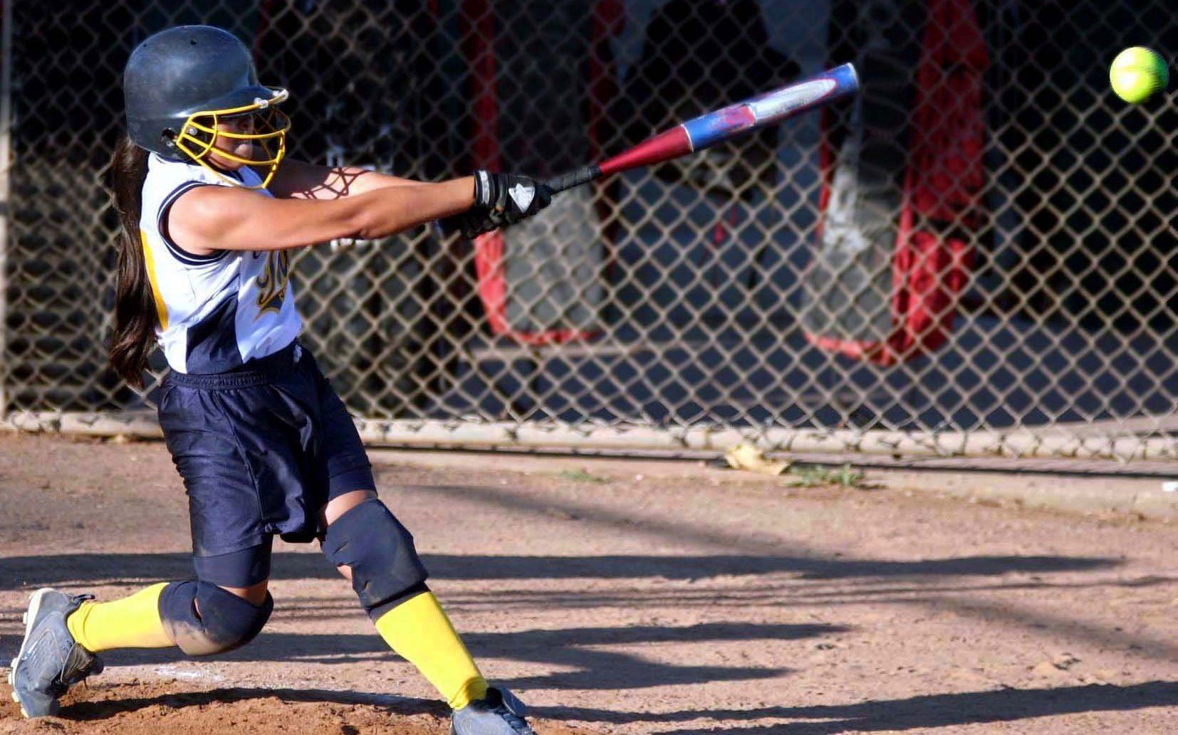 Girl Swinging The Bat — Salinas, CA — TechPro Athletics Girl Swinging The Bat — Salinas, CA — TechPro Athletics