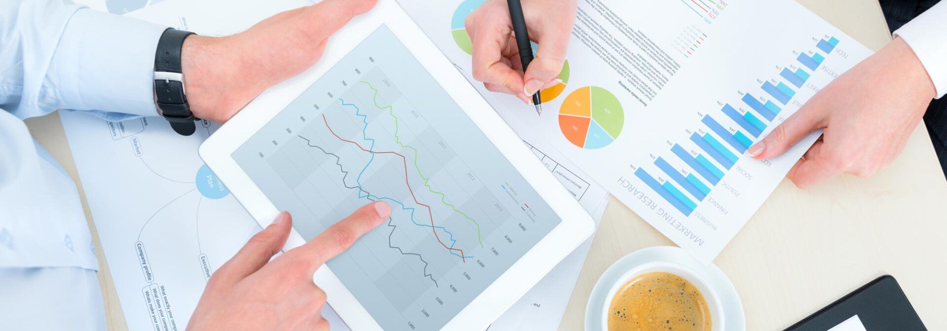 Business team analyzing graph, chart document report and marketing research