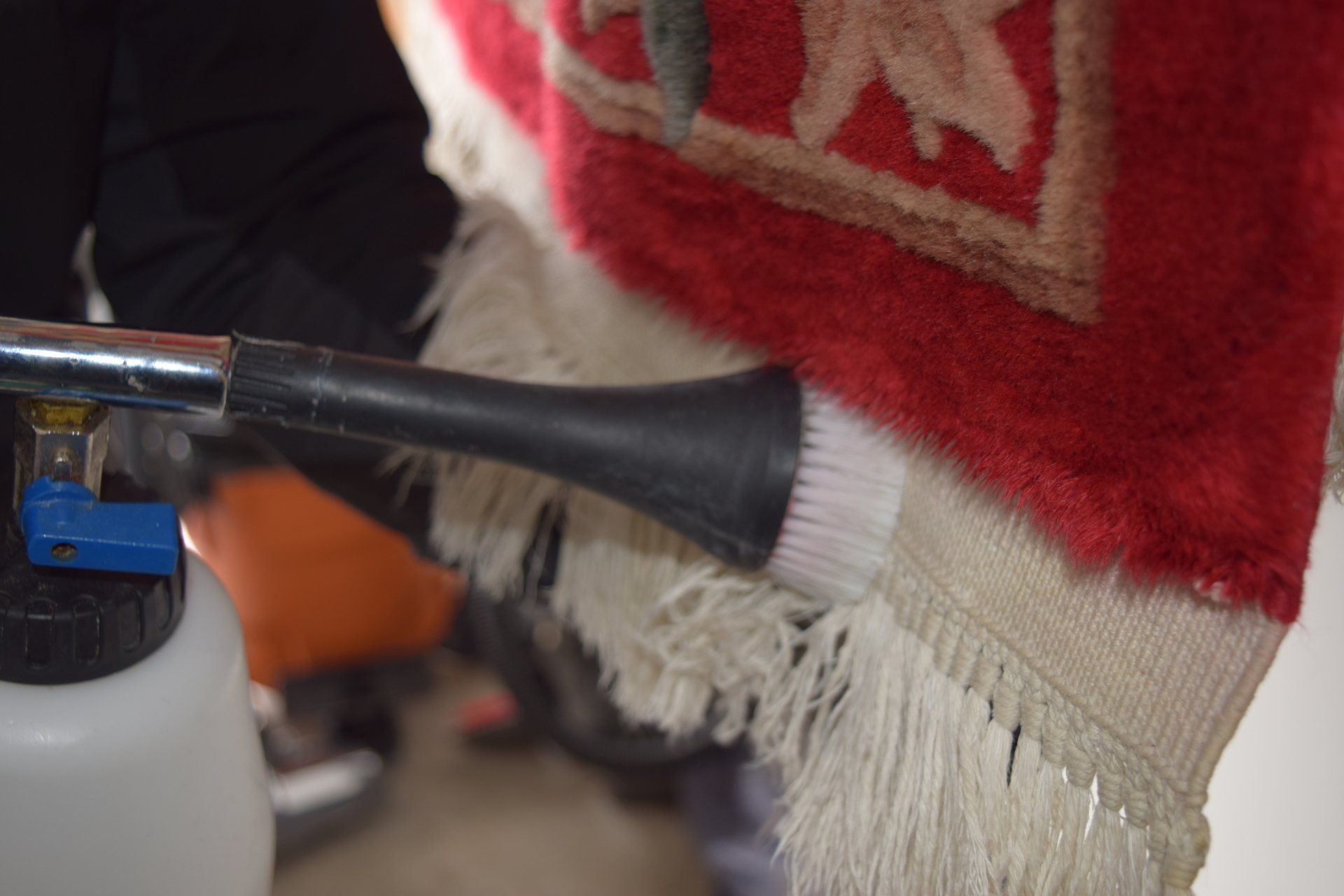 Technician doing rug cleaning in Davenport IA by Mr. B's