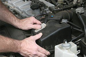 Auto Service — Mechanic Hands On Filter Cover in Lafayette, IN Auto Service — Mechanic Hands On Filter Cover in Lafayette, IN