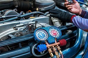 Refrigerant Charging — Car Repair Air Conditioner in Lafayette, IN Refrigerant Charging — Car Repair Air Conditioner in Lafayette, IN