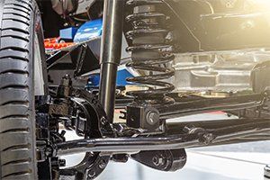 Mufflers — Front Axle with Suspension in Lafayette, IN Mufflers — Front Axle with Suspension in Lafayette, IN