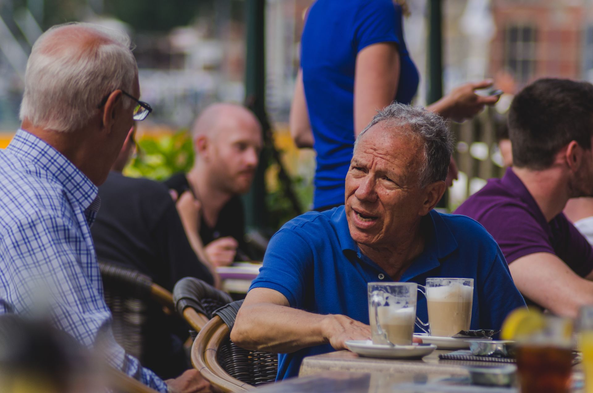 two_old_men_not_comfortable_while_having_there_snack_in_a_restaurant_on_the_gold_coast