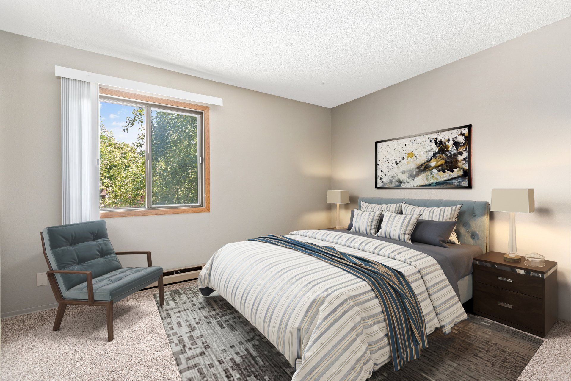 A white, carpeted bedroom with a large window looking out onto trees