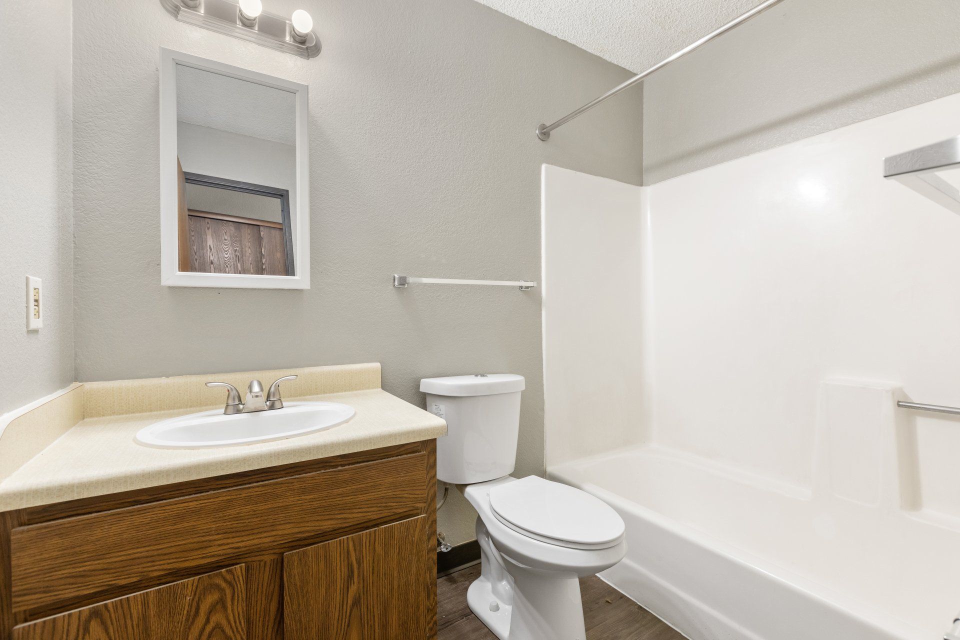 Bathroom with tub and shower combo