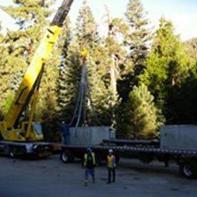 Two Workers Checking Crane Trucks — Hesperia, CA — KAT Cranes