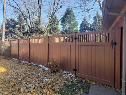 Vinyl - Wood Grain Fence — Vinyl Fence at Garden in South Rockwood, MI